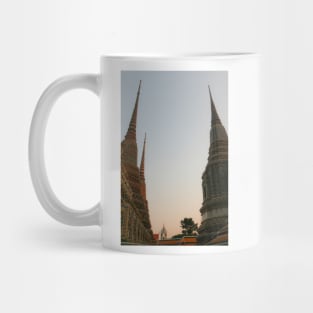 Second view of two stupa against sky at Wat Pho Mug